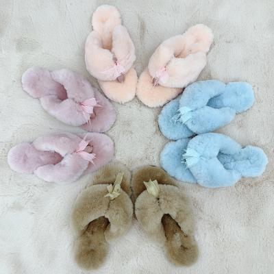 China Custom Soft Sheepskin Slippers Bedroom Flip Flops Comfortable Non Slip Fuzzy Thong Shearling Fur Fluffy Fashion Trend For Women 2021 for sale