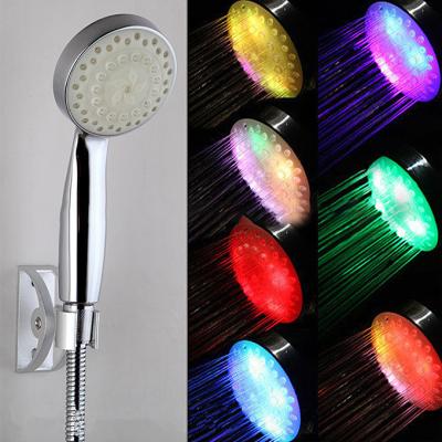 China Needle Free Unique Porcelain LED Products 7 Colors Best Hand Held Shower Head Heating Bathroom Plastic Shower Head for sale