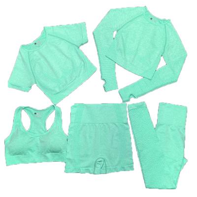 China Factory Direct Supply Breathable Sporty High Waist Women's Tight Yoga Pants With Pocket 5 Piece Set for sale