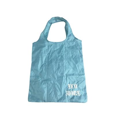 China Sustainable Recycled Eco Bags Wholesale RPET Bag Fashion T-shirt Fabric Folding Travel Bag for sale