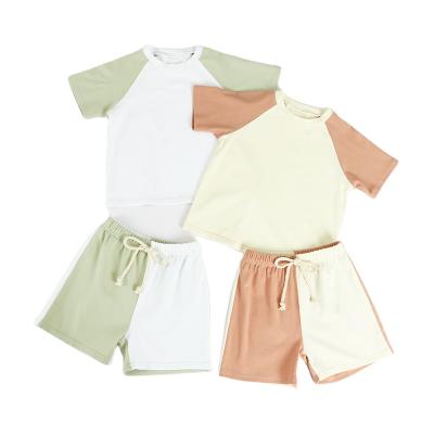 China Newly Designed Casual Summer Cotton Fabric Soft Short Sleeve Babies Clothing Sets for sale