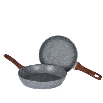 China Traditional hot sale 26cm aluminum marble stone coating forged fry pan with wood paint handle non stick cookware for sale