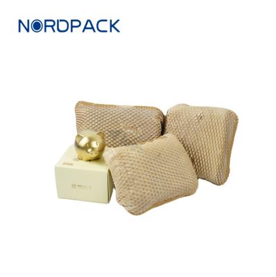 China Recycled Materials Custom Recycled Food Material Biodegradable Honeycomb Wrap Paper Wrapping Paper Cushion for sale