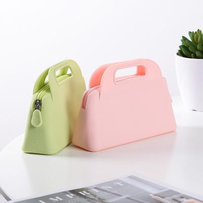 China Fashion Silicone Cosmetic Bag Travel Makeup Bag Silicone Pouch Key Case Storage Wallet Custom Reusable Coin Purse for sale