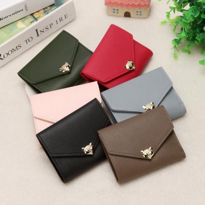 China Factory new small coin purse women's mini ladies student buckle wallet simple folding short wholesale fashion waterproof for sale