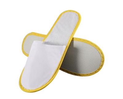 China Manufacturer Brand Name Comfortable Non Woven Material Hotel Slippers for sale