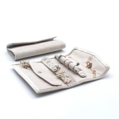 China Newest Wholesale Custom Women Travel Jewelry Bag beige Velvet Jewellery Roll for rings earrings necklace for sale