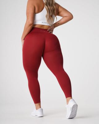 China NVGTN Breathable Women's Running Gear Plus Size Snug Fit Dry Sweatpants And Top Carmine Solid Seamless Leggings Waisted for sale