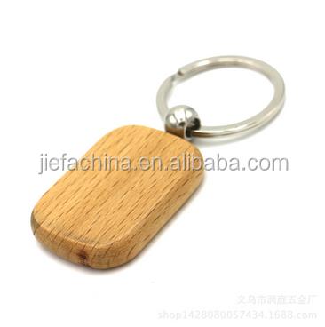 China Different Designs Custom Design Logo White Wood Key Chain for sale