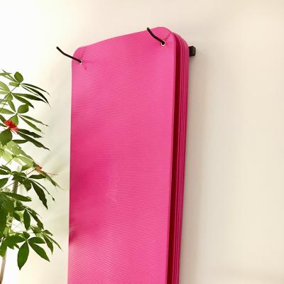 China Wall Mounted Yoga Mat Wall Rack Yoga Mat Storage Rack Gym Rack for sale