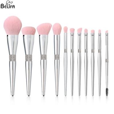 China Luxury cosmetic bling silver pink private label 11pcs glitter makeup brushes set cleaner holder with white diamond package box for sale