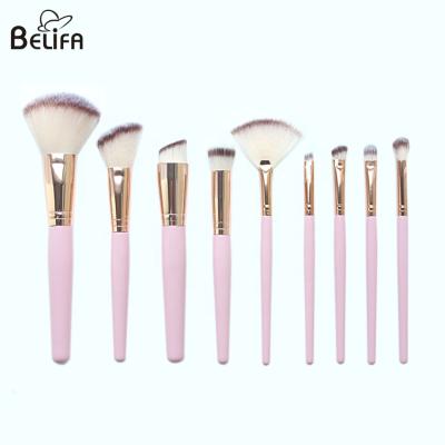 China Belifa new products customized vegan synthetic hair pink wood handle 9 piece rose gold makeup brush set for sale