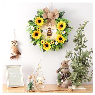 China Decorative Artificial Christmas SUN Flower Garland Outdoor Front Entrance Decoration for Bee Day Home sping Decoration for sale