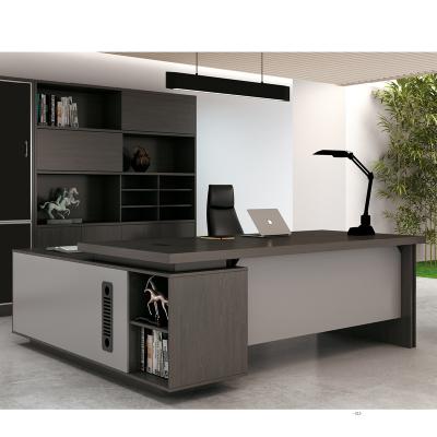 China The side cabinet can be changed to the cheap but high quality pictures executive table modern office desk table from left or right side for sale