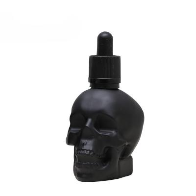 China 30ml 60ml 120ml Cosmetic Liquid Skull Glass Dropper Bottle With Shrink Wrap Label For Beard Oil/Essential Oil for sale