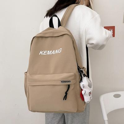 China Waterproof Young Rice White Large Capacity School Students Bags New Style Soft Cloth Backpack Casual Sports Backpacks for sale