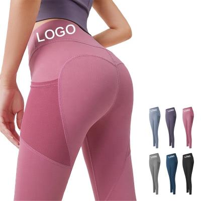 China Wholesale High Quality Viable Nylon Butt Lift Yoga Pants Logo Printed Sexy Pants With Pockets Women Yoga Breathable Fitness Yoga Pants for sale