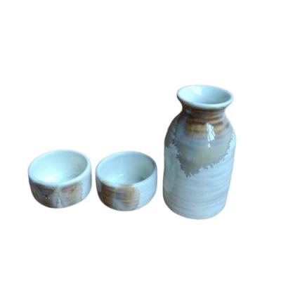 China Sustainable Style Japanese Hand Made Stoneware Korea Ceramic Sake Set Wine Pot Saki Set With Glazed Point for sale