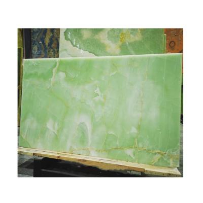 China Modern Translucent Green Green Onyx Slab Stone Price for sale