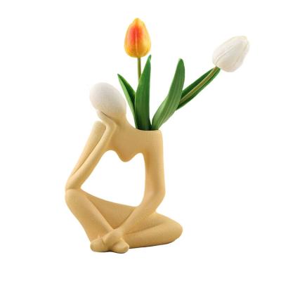 China 2022 New Minimalist Unique Human Body Shape Creative Home Decor Red Yellow White Ceramic Flower Vase for sale