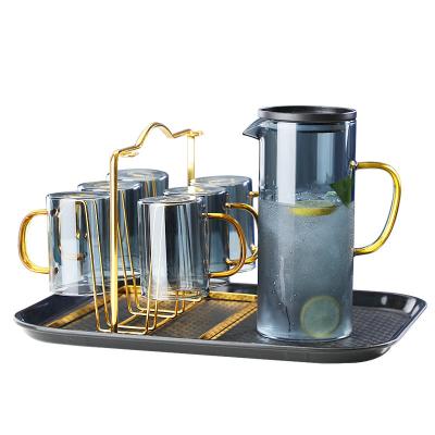 China Sustainable Handle Luxury Gold Borosilicate Drinking Tea Juice Water Glass Jug Set With Tray for sale