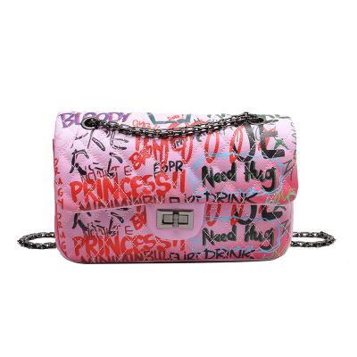 China Fashion New Fashion Women Handbags Metal Lock Message Bag PU Graffiti Leather Cross - Body Shoulder Handbags for sale