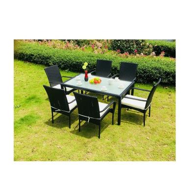 China Modern Outdoor PE Wicker Sofa All Weather Furniture Cushioned Rattan Chairs With Tempered Glass Coffee Table for sale