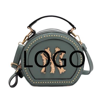 China Factory Wholesale 2021 Fashion Fashion Small Portable Shoulder Round Bags New Fashion Ladies Messenger Bags Woman Handbag Female Rivet for sale