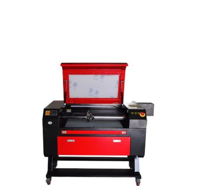 China Water Cooled 7050 Portable CO2 Laser Engraving Machine Cutting Machine for sale