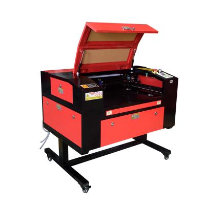 China Folded Legs Mini Automatic Ostrich Egg Carving Laser Machine With Rotary System for sale