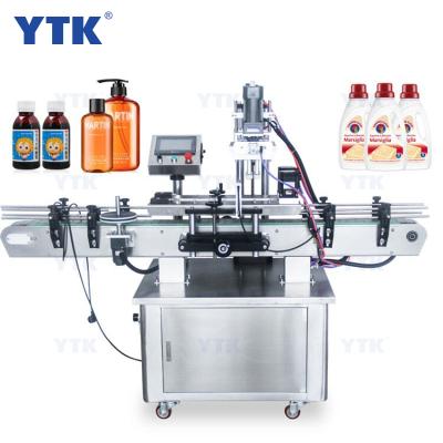 China High Speed ​​Automatic Food YTK Screw Capping Machine With Auto Cap Feeder for sale