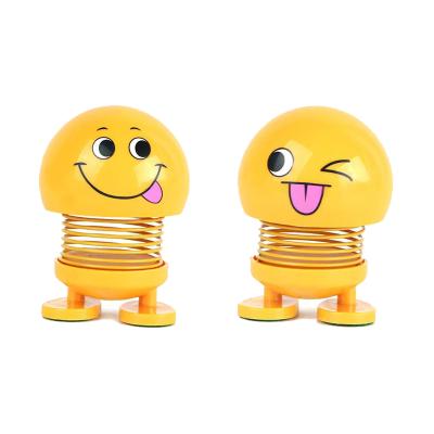 China ABS+Spring face spring smile doll shaking his head creative table QQ car emoticons doll happy doll toys for sale