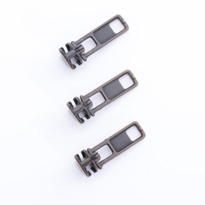 China Wholesale Popular Brass Automobile / Non Lock Zipper Key Slider For Luggage Bags for sale