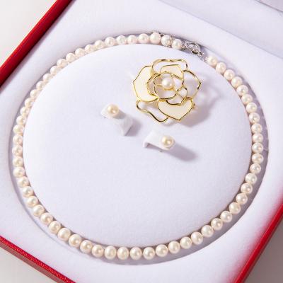 China Unique Mothers Day Gifts Natural Freshwater Pearl 14k Gold 7-8mm Flat Round Necklace 3 Piece Brooch Pearl Necklace Set Stud Earrings for sale