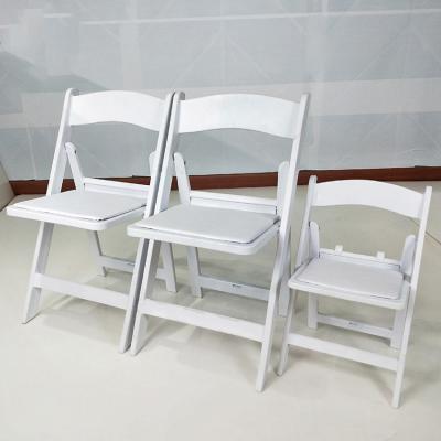 China Modern Factory Price America Resin Folding Padded White Chair For Event Weddings for sale