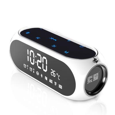 China Hot Sale New Multi Functional FM Wireless Radio Alarm Clock Speaker Phone Function Wireless Speaker for sale