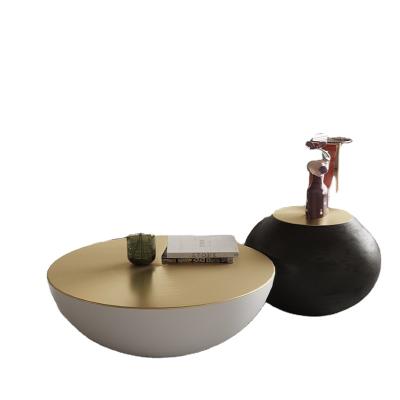 China Modern Designer Round Tempered Glass Light Luxury Modern Coffee Table Set for sale