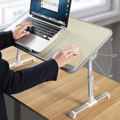 China (Height) adjustable adjustable and stowable laptop stand with fan for sale