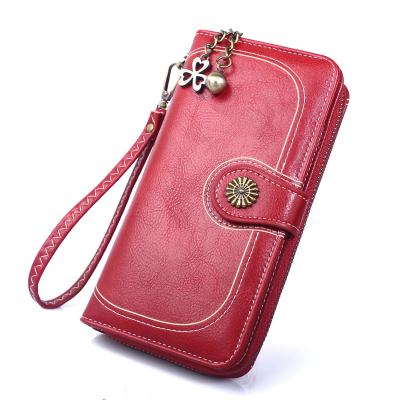 China Fashion Women's Long Wallets PU Leather Large Capacity With RFID Protection Wristband Bag for sale