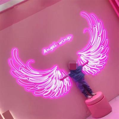 China Simple LED With Background Glowing Wall Letters Neon Angel Wings for sale