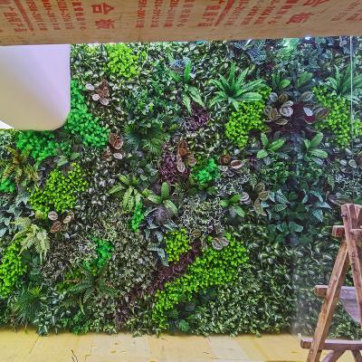 China Indor Decoration Design New Customized Jungle Style Vertical Plants Wall Hanging Plant Artificial Green Grass Wall For Home Decoration for sale