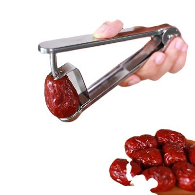 China Cherry Coring Tool Creative Small Viable Cherry Coring Tool Kitchen Accessories Stainless Steel Home Red Hollow Puncher for sale