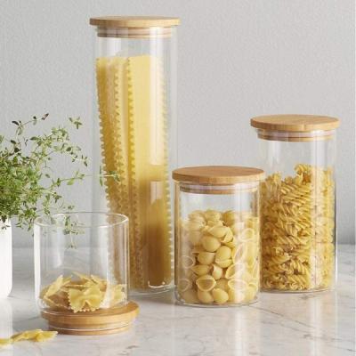 China Custom Round Clear Container Food Storage Canister Freshness Keeping Kitchen Glass Jar With Bamboo Lid for sale