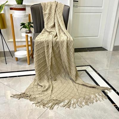 China SIPEIEN Nondisposable Nordic Exquisite Soft Knitted Texture Solid Color Sofa Blanket With Tassel for sale