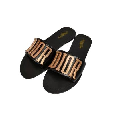 China A pair Anti-slippery to board the one-piece open toe shoes CSI new popular flat female flat slippers chic summer leather shoes for girls for sale