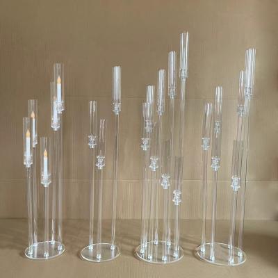 China Home Decoration 9 Arm Decorating Candle Holders Clear Acrylic Crystal Taper Tall Pillar Wedding Centerpieces Candelabra for Wedding Table for sale