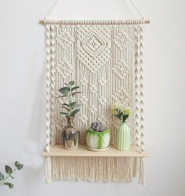 China Indoor Outdoor Macrame Wall Hanging Shelf Macrame Wall Hanging Art Decor Woven Rope Plant Household Items for sale