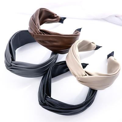 China New Fashion Women's Fashion RARA Winter Solid Color Cross Knot Headband Knot Headbands PU Leather Turban for sale