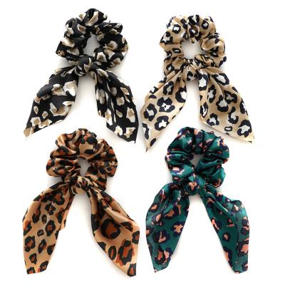 China RARA Women Hair Scrunchies Women Shapes Elastic Hair Tie Hair Accessories Fabric Rabbit Ear Leopard Hair Scrunchies for sale