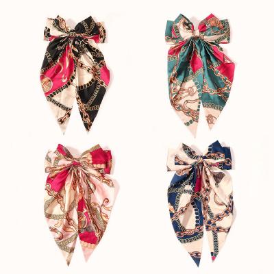 China RARA fabric hot sale korean style hair accessories spring ribbon satin bow hairpin flower print hair clips summer for women for sale